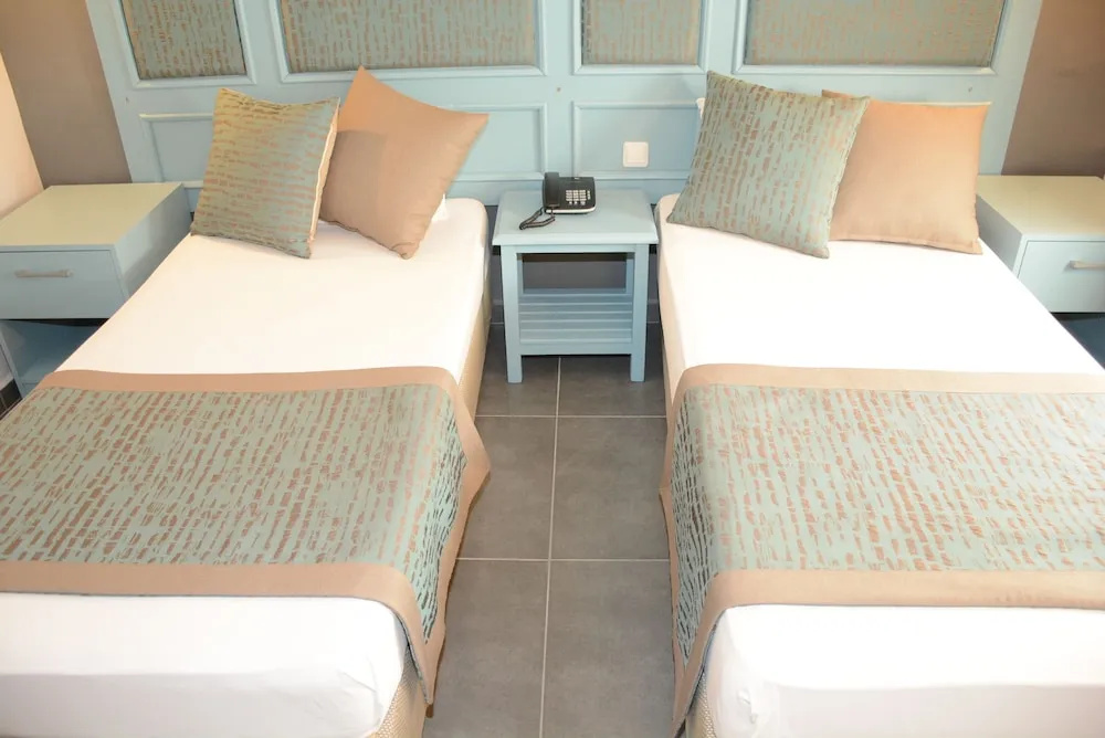 Otel Atrium - Chambres