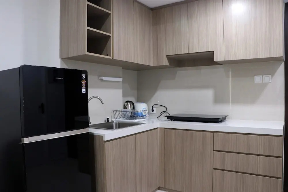 Comfort and Minimalist 2Br at Daan Mogot City Apartment