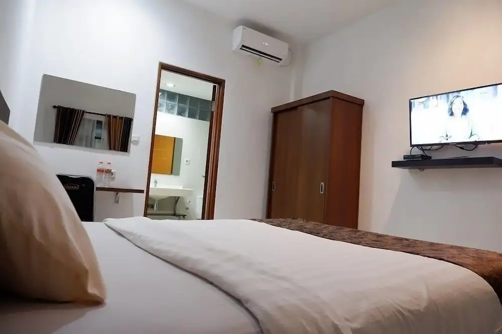 Netral Hotel - Chambres