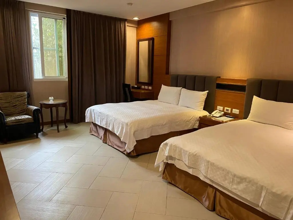 Chia Shih Pao Hotel - Chambres