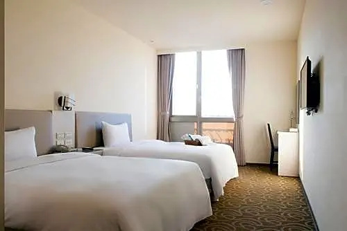 Qin Hai Hotel - Chambres