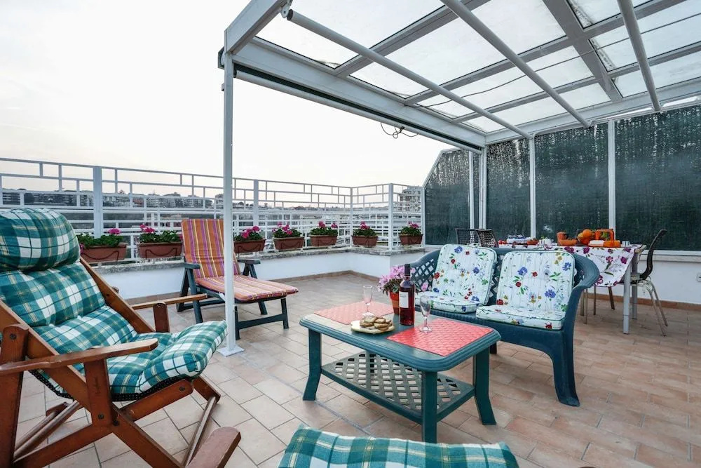Enjoy the Sunset on Your Vatican Terrace