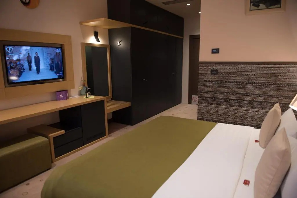 Atera Business Suites - Chambres