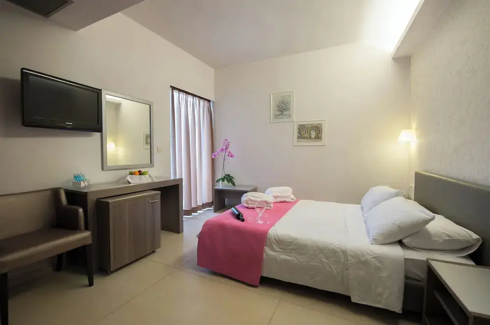 Astron Hotel - Chambres