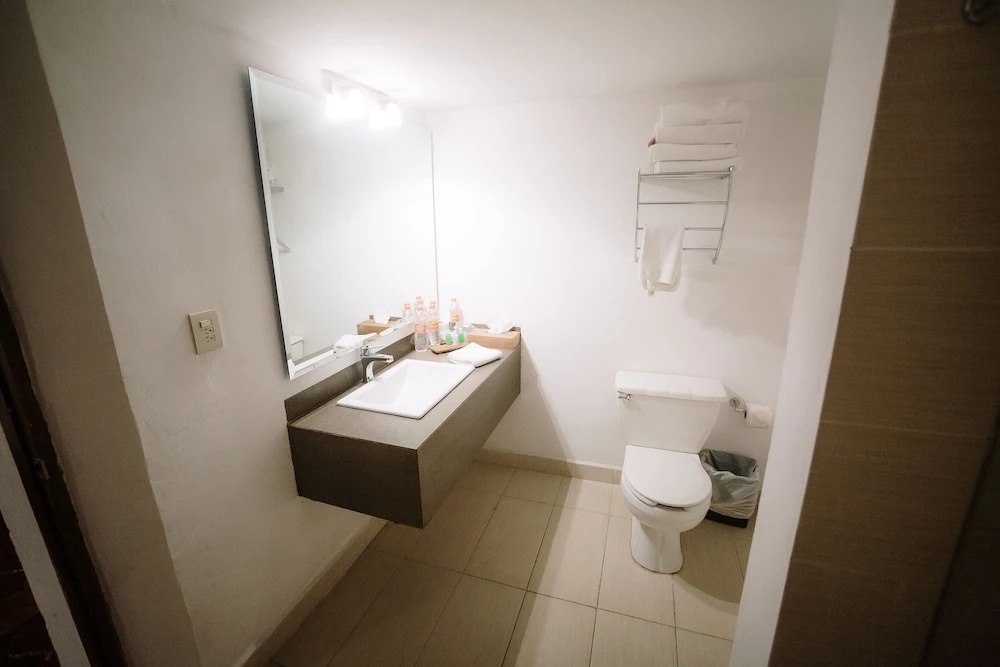 Hotel Hostal El Farol - Chambres