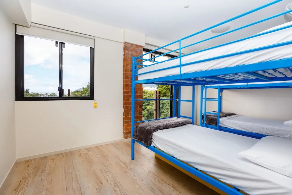 Bed in Dorm with balcony and with water view