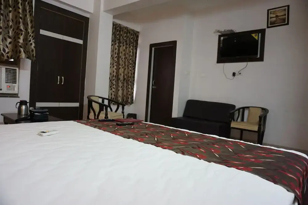 Hotel Mani International - Chambres