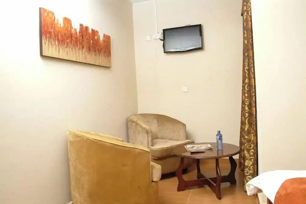 The Coconut Grill Hotel - Chambres