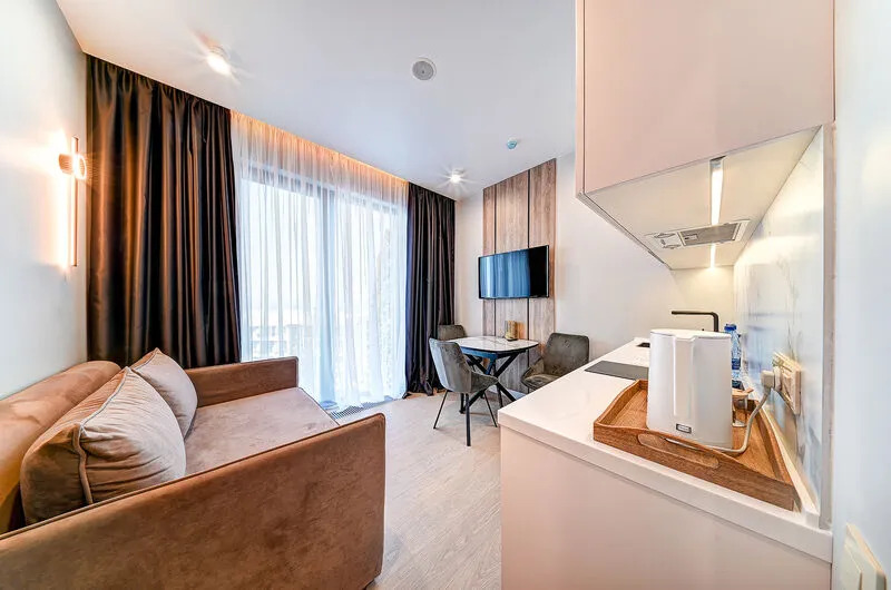 Двухместный номер Deluxe с видом на море двуспальная кровать в Real Apartments Sochi