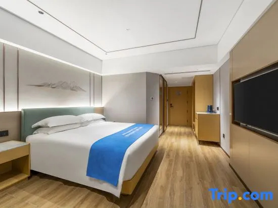 Xinyue Hotel - Chambres
