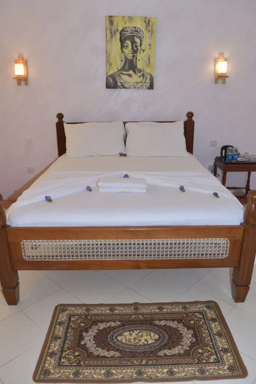 Chukwani Executive Inn - Chambres