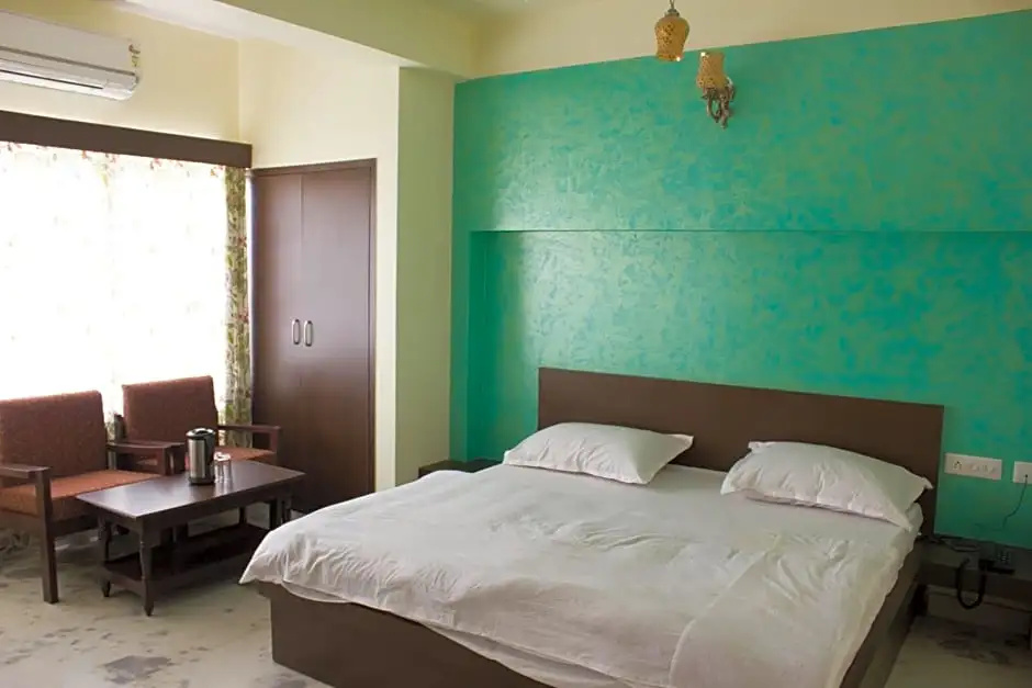 Hotel Holiday Home - Chambres