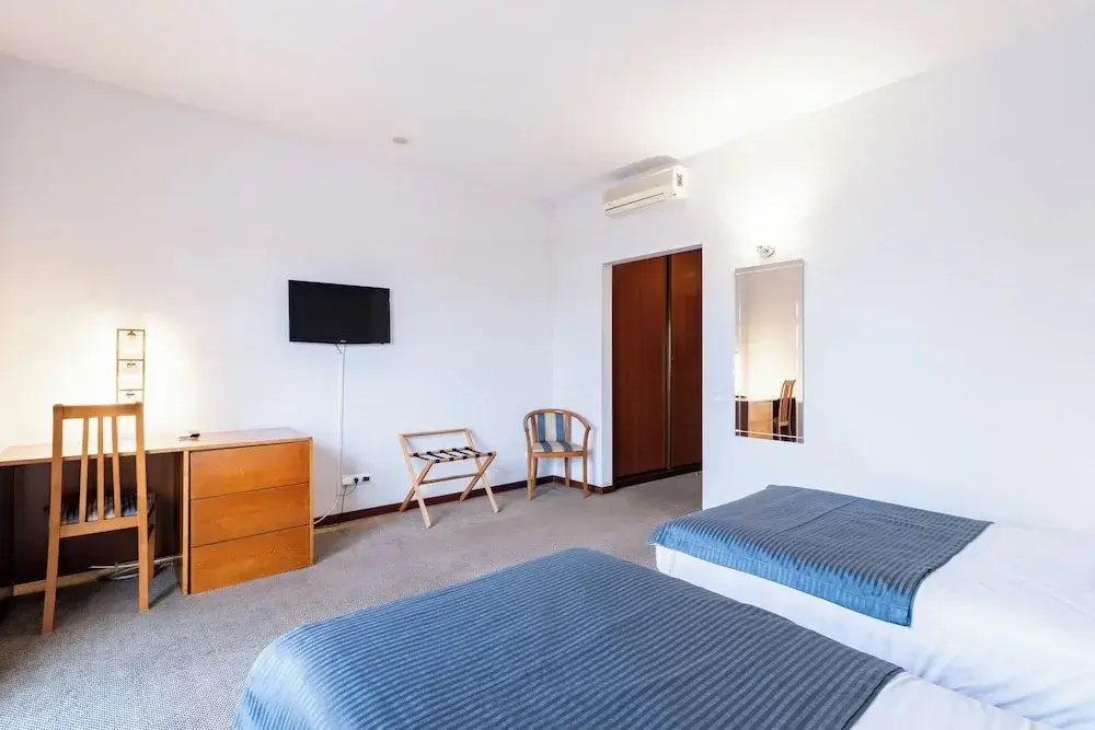 La Fontaine Hotel - Chambres