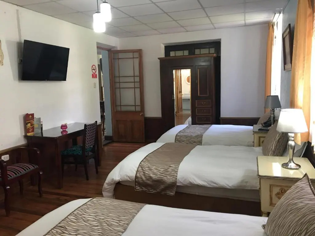 Queen's Villa Hotel Boutique - Chambres