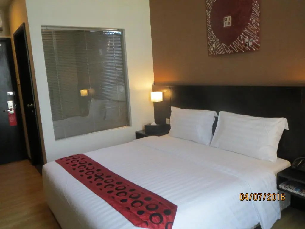 Tat Place Hotel - Chambres