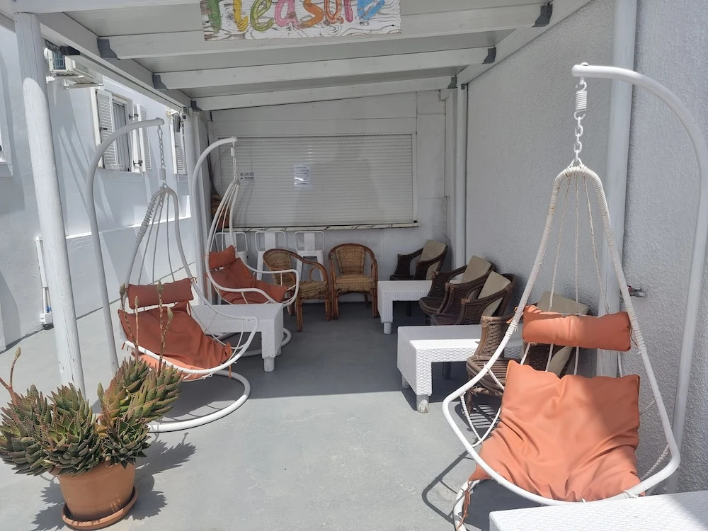 Santorini Studios Pleasure By The Sea
