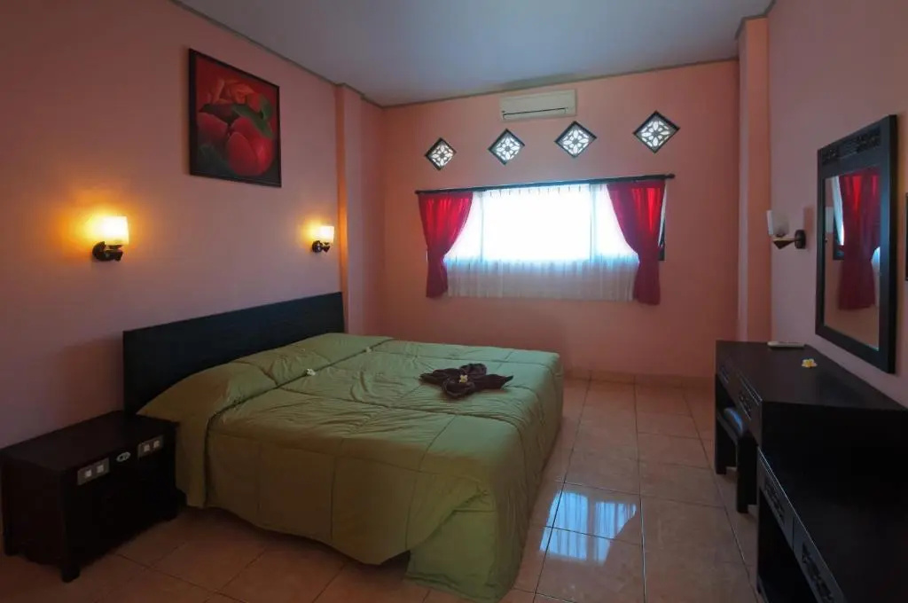 Pesona Beach Inn - Chambres