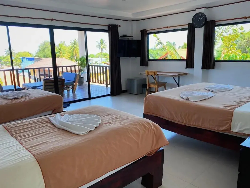 The Reef Hotel & Studios - Chambres