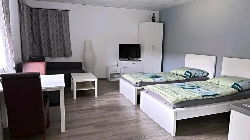 Aparthotel DKS - Chambres