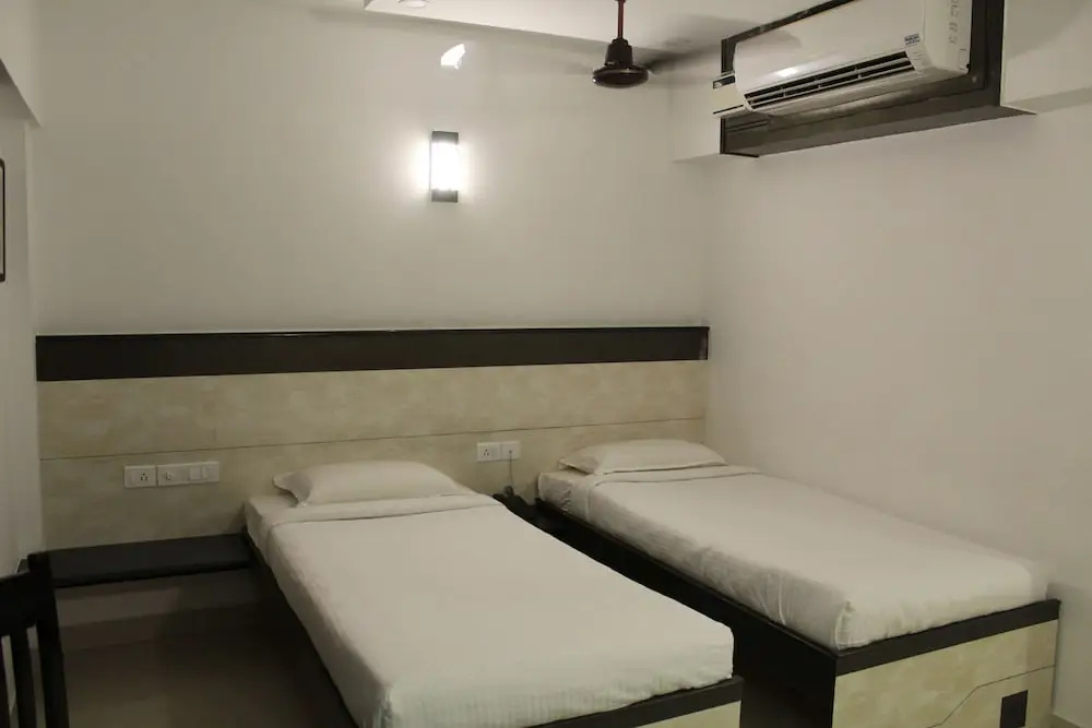 Hotel Karpagam International - Chambres
