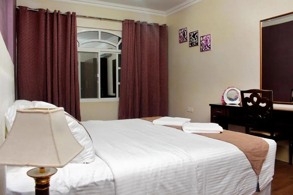 Delmon Hotel Apartments - Chambres