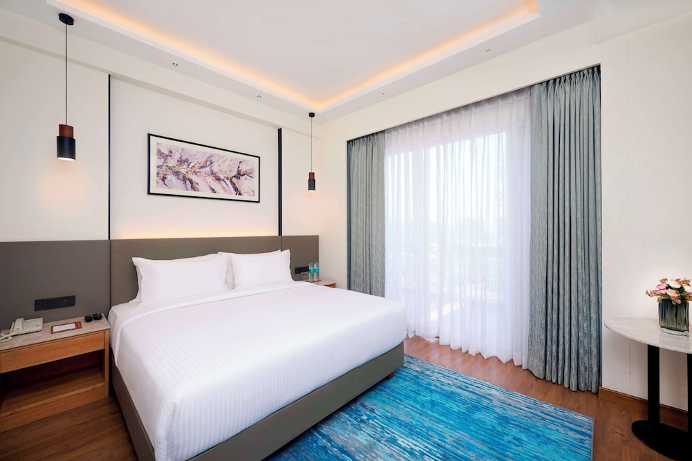 Double Junior Suite with balcony and with pool view (full double bed)