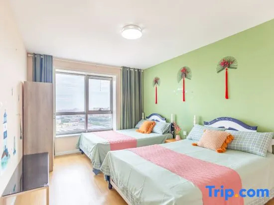 Люкс с 2 комнатами с видом на море в Rizhao Shuohai Seaview Homestay (Wanpingkou Branch)