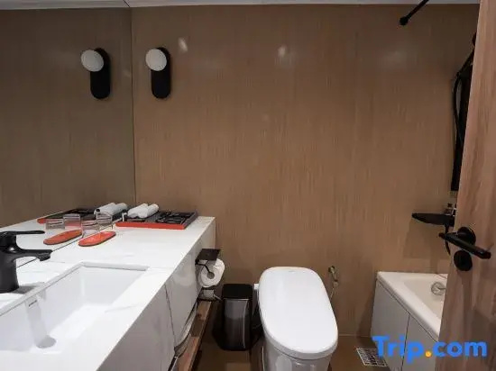 Jingguang Center Apartment Hotel - Chambres
