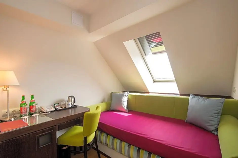 Three Corners Hotel Art - Chambres