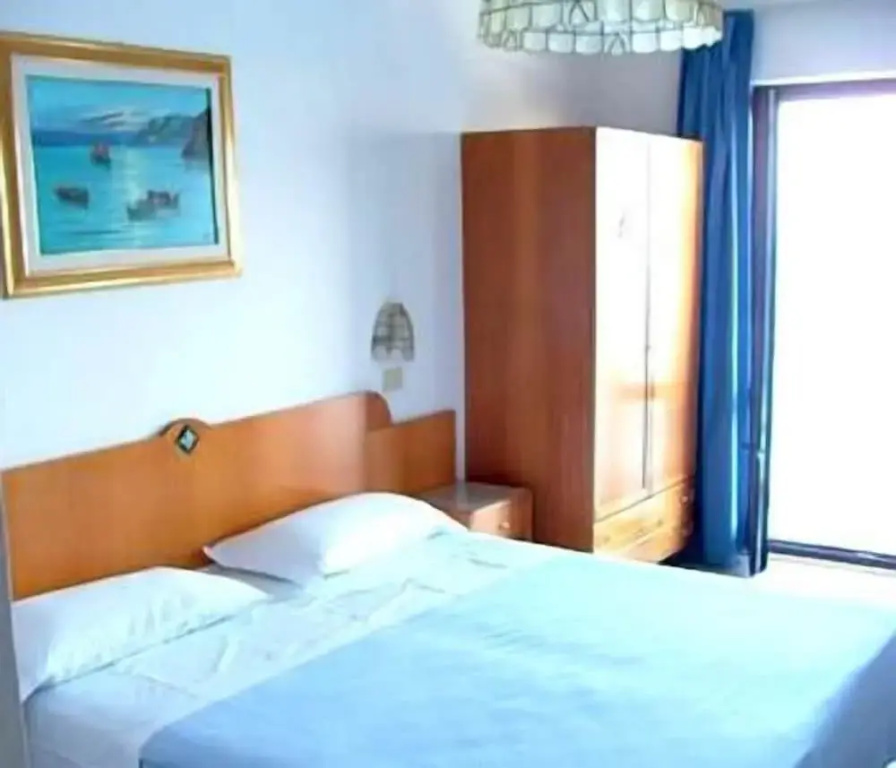 Standard Triple room with balcony and with sea view