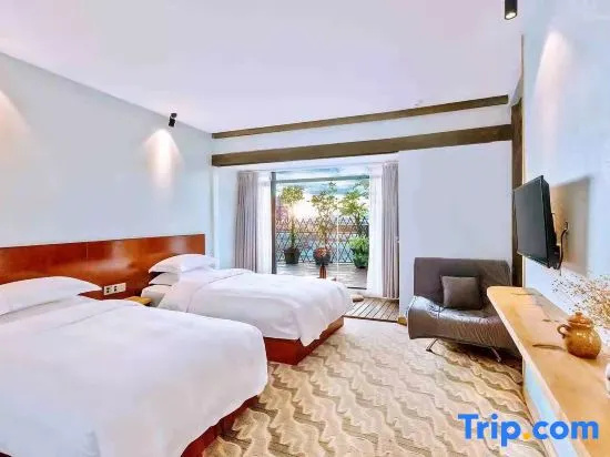 Yiya Holiday Inn - Chambres