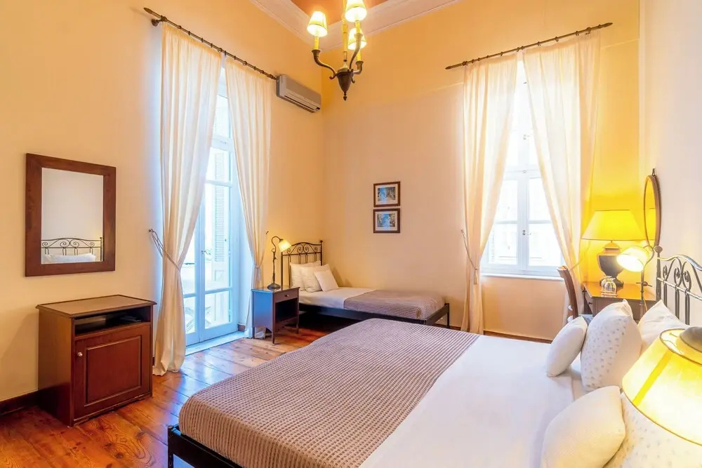Classic Triple room with balcony and with partial sea view