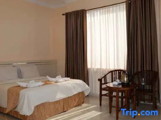 Griya Hotel - Chambres