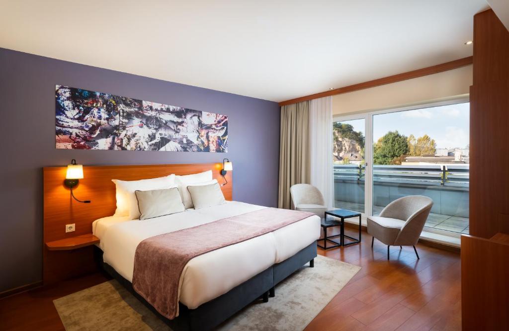 Трёхместный люкс в Leonardo Hotel Salzburg City Center