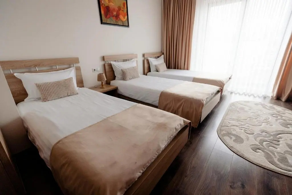 Aparthotel Punct pe i - Chambres
