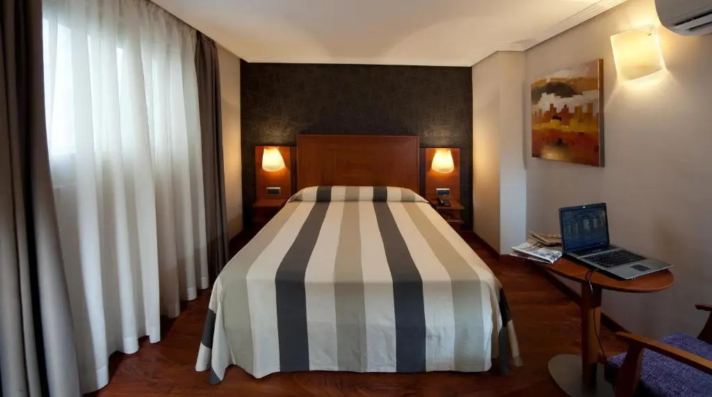 Hotel Nuevo Torreluz - Chambres