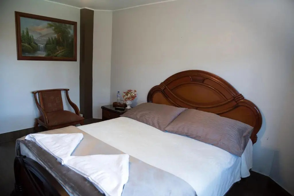 Standard Quadruple room with garden view