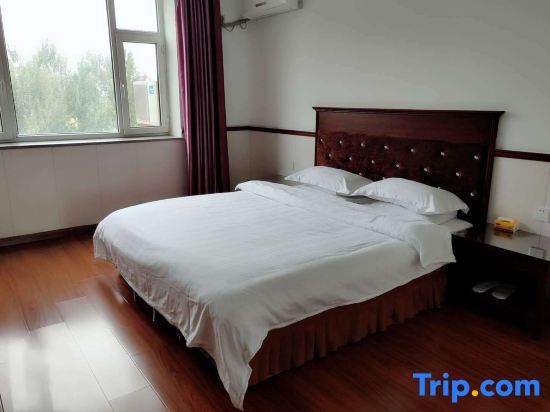 Двухместный номер Business двуспальная кровать в Dongshi Hotel (Changchun Jingyue)