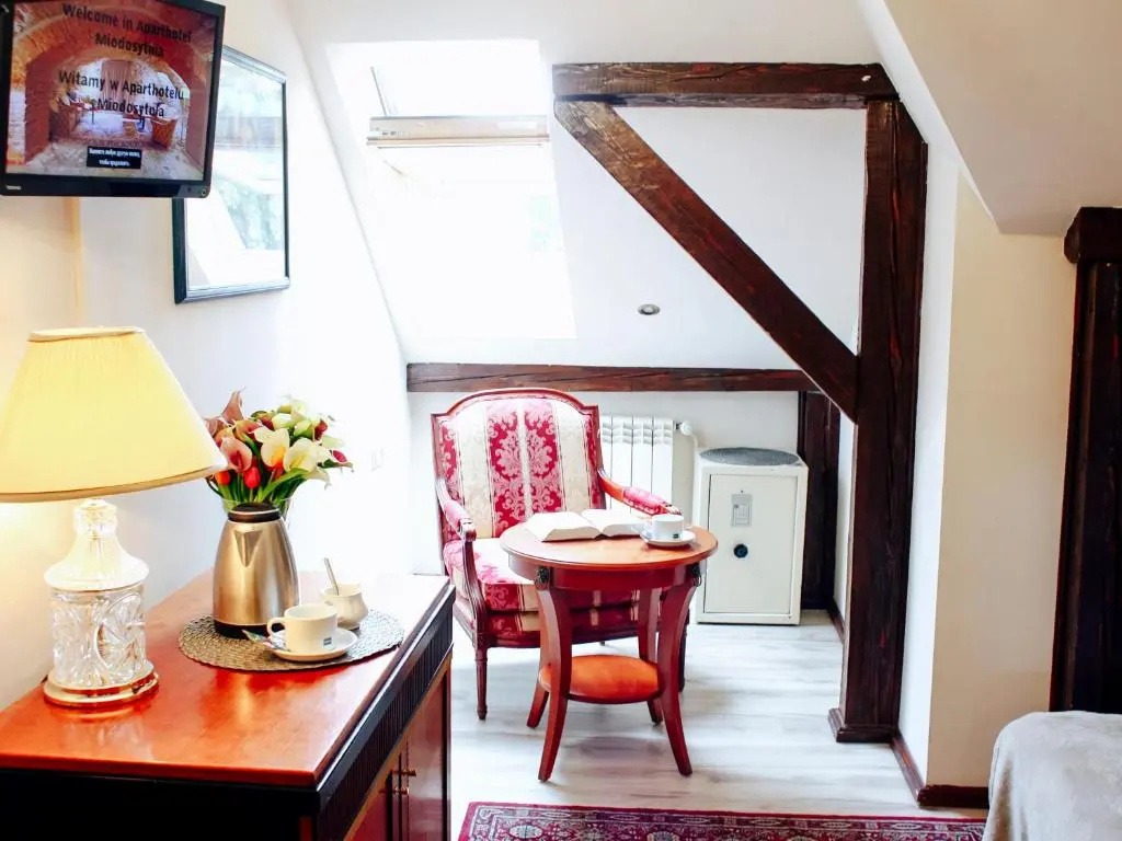 Aparthotel Miodosytnia - Chambres