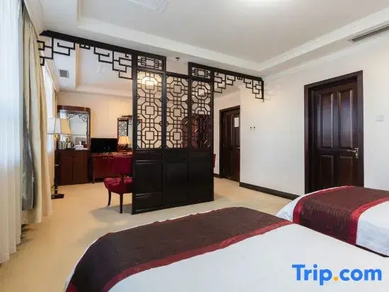 Xinmao Tiancai Hotel - Chambres