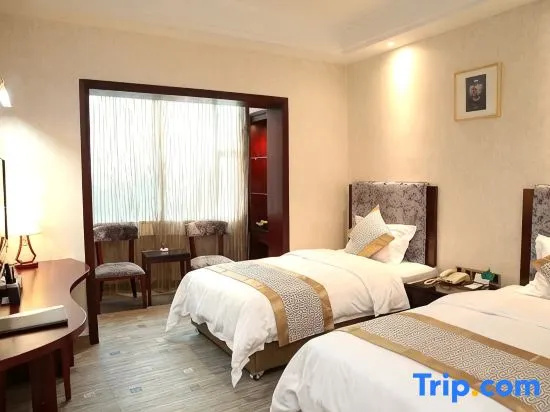 Yi Long Hotel - Chambres