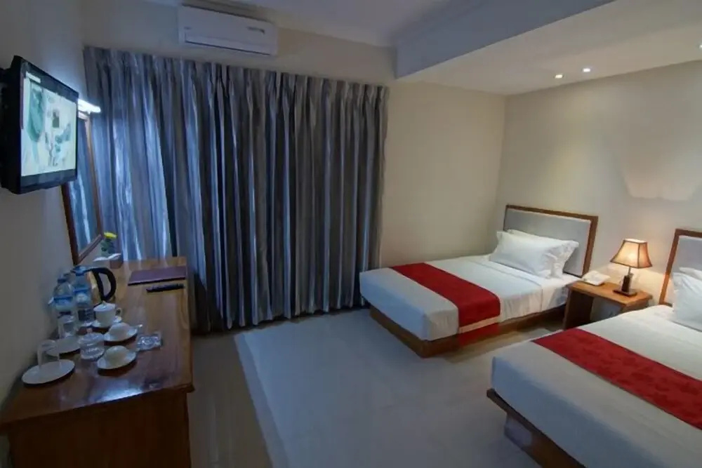 Yadanar Theingi Hotel - Chambres