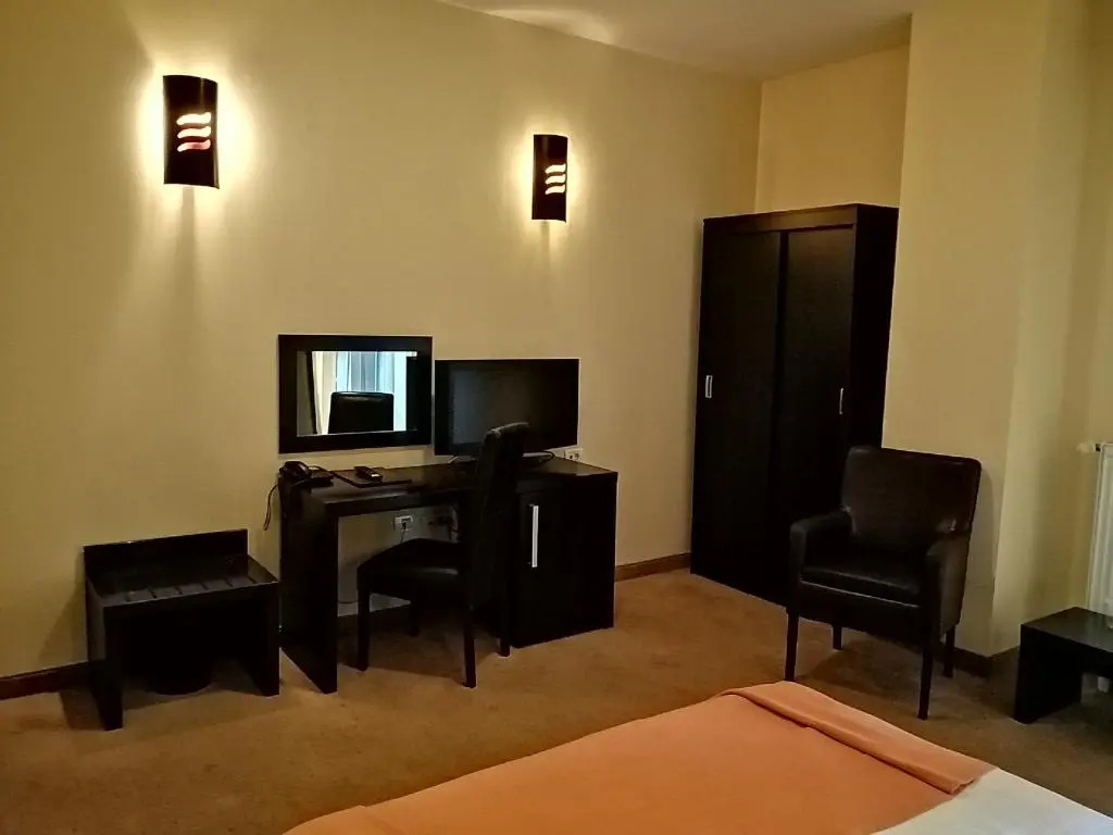 Maxim Hotel - Chambres
