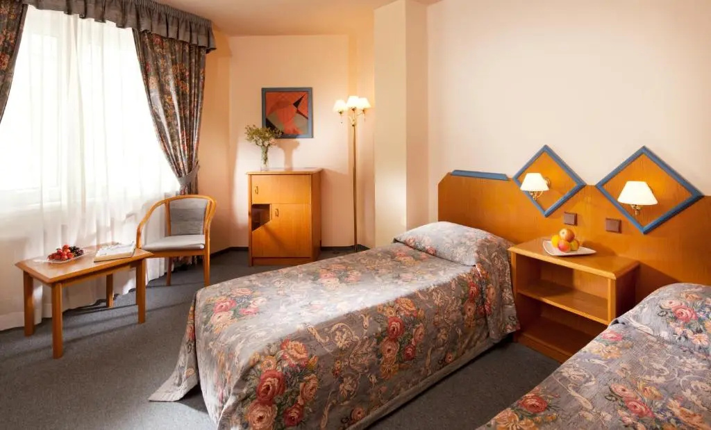 Hotel Concertino Zlatá Husa - Chambres