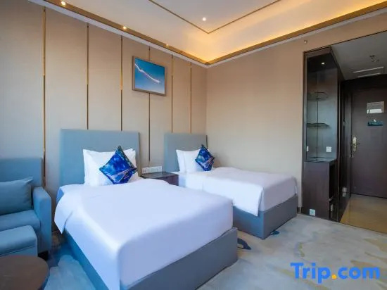Zhuhai Xinhang Hotel - Chambres