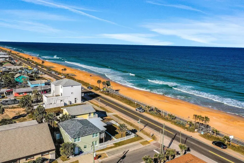 Updated Home Across From Beach With Covered Balcony, Central AC, & Washer/dryer