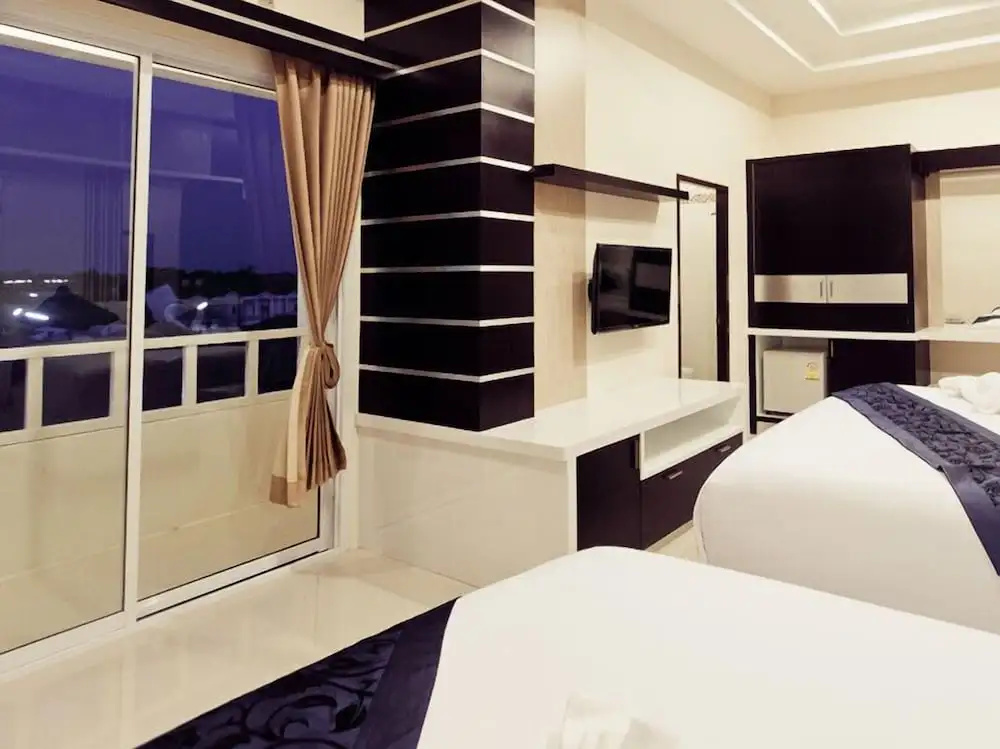 Excella Hotel - Chambres
