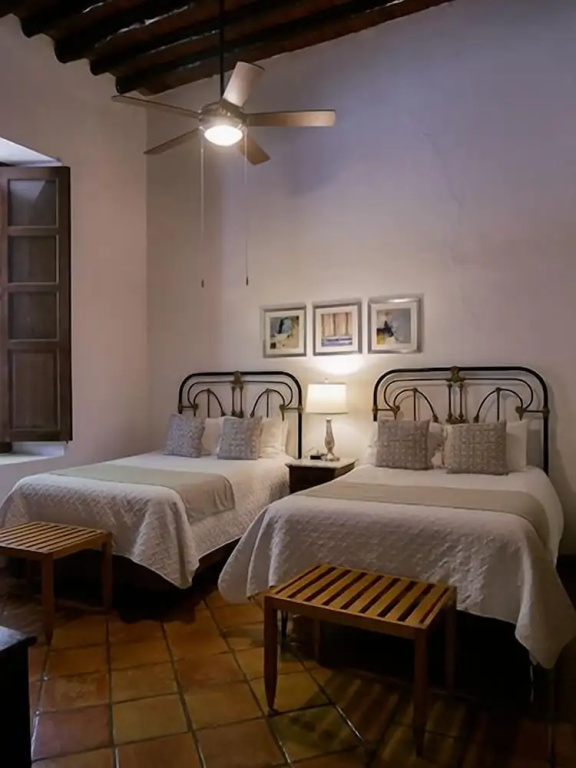 Hotel Hostal El Farol - Chambres
