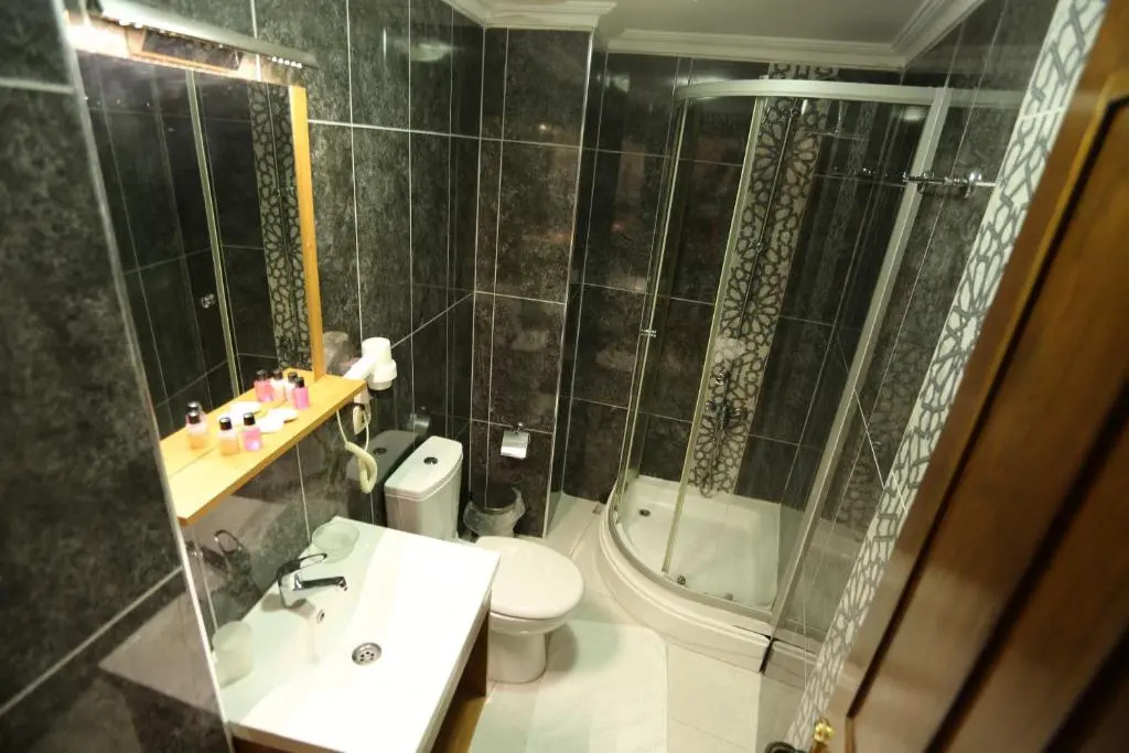 Tashkonak Studio Suites - Chambres