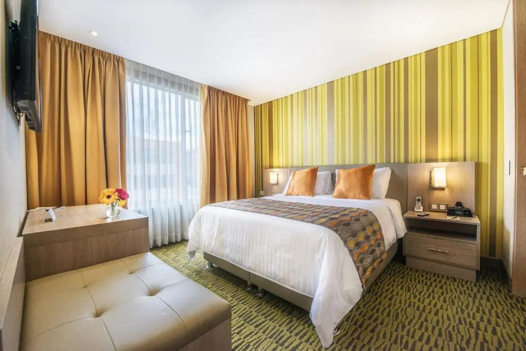 Hotel Plaza Suites - Chambres